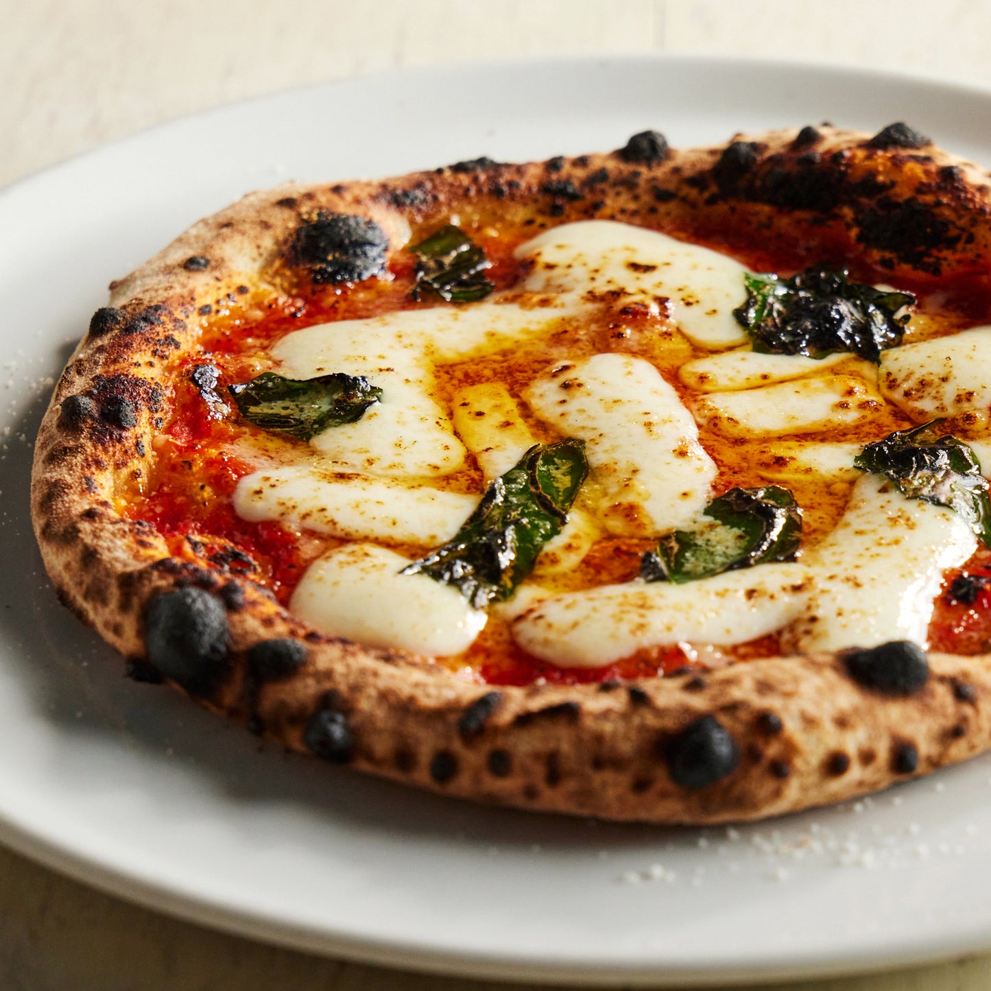 マルゲリータ・ブッファリーナPizza (水牛モッツァレラ、トマトソース、バジル)